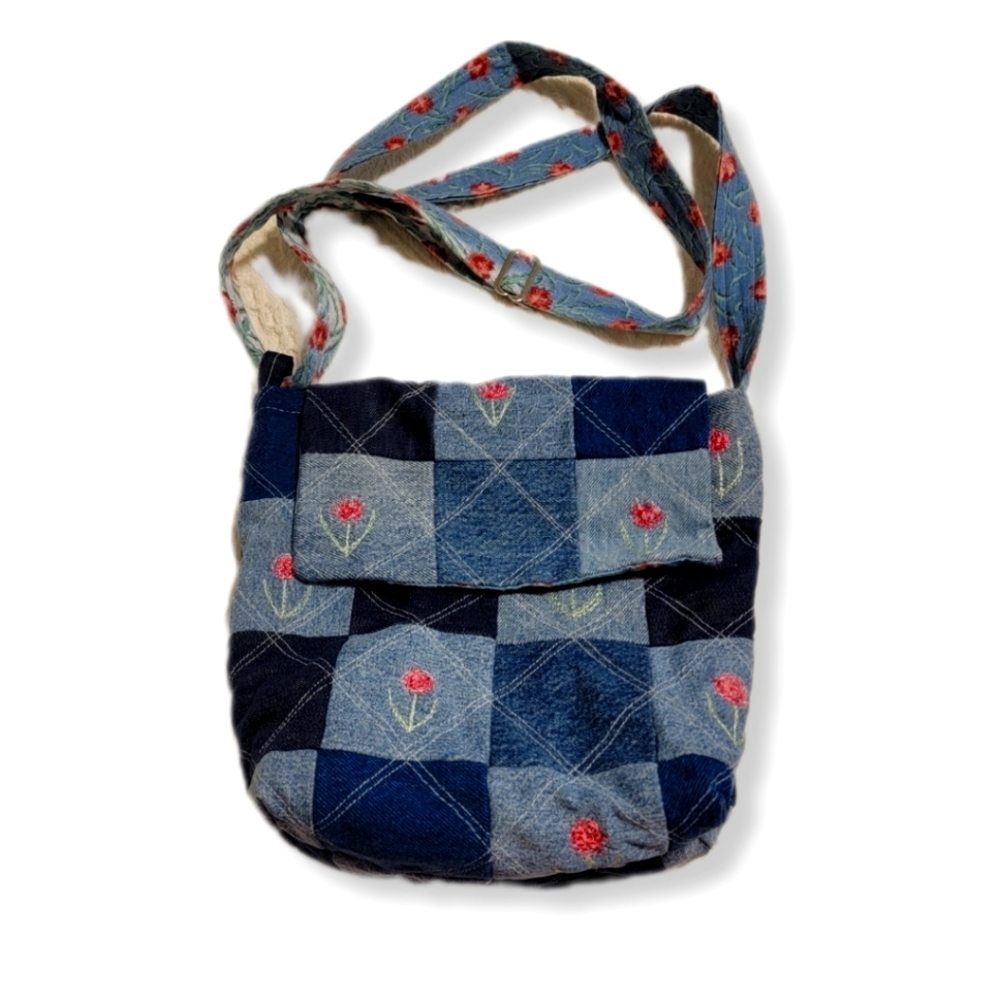 Upcycled Shades of Blue Jean patchwork pattern with one snap flap closure